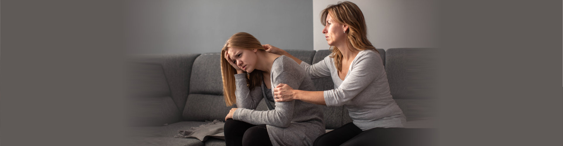 psychologist comforting the young lady